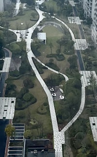 an aerial view of a park in a city